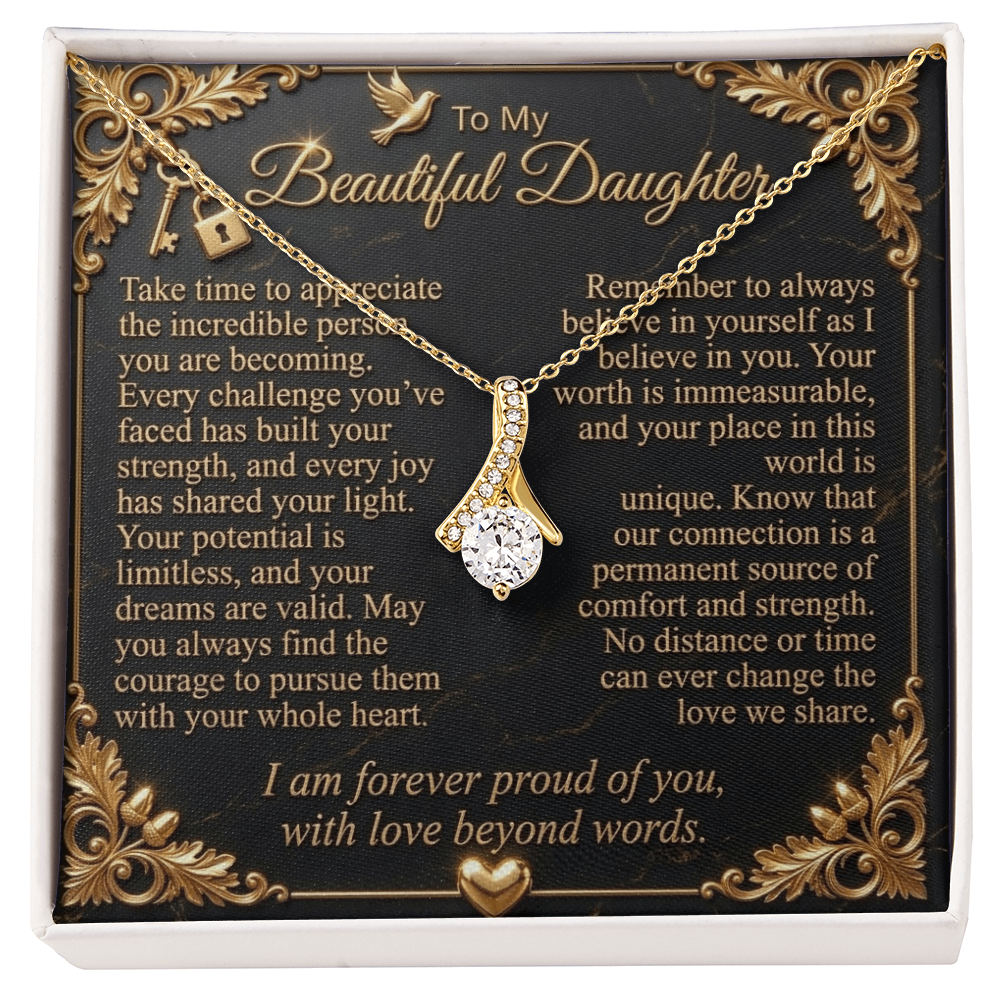  Yellow gold-finish Alluring Beauty necklace over a black-and-gold “To My Beautiful Daughter” message card.