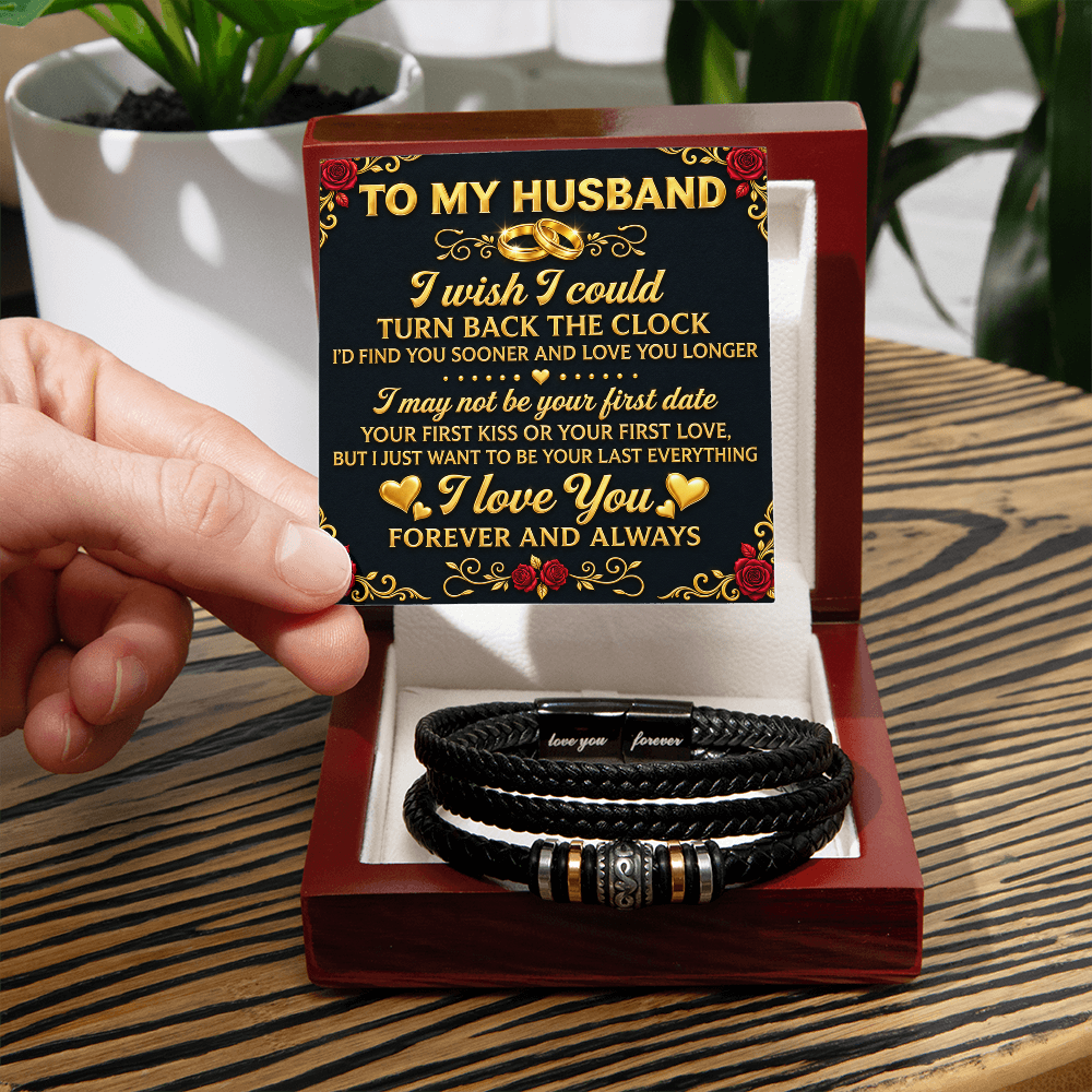Mahogany-style gift box displaying a black braided bracelet and “To My Husband” message card on a wooden table.