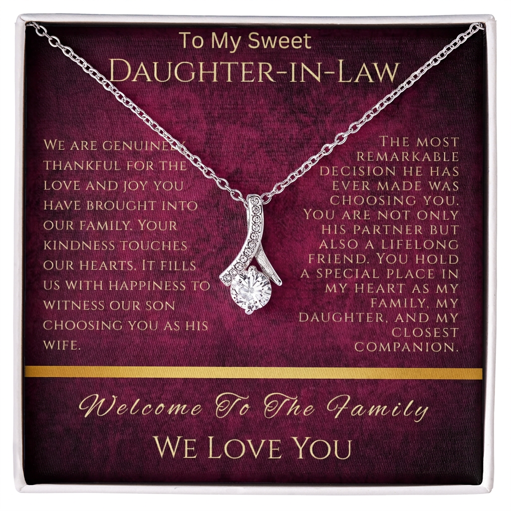 White gold-finish ribbon pendant necklace over a burgundy and gold “To My Sweet Daughter-in-Law” message card.